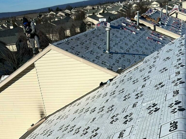 roofers preparing to install new roof shingles