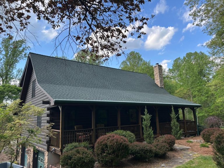 a cabin with dark green roof shingles in mohnton pa